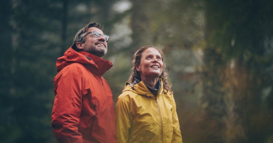 couple hiking in jackets